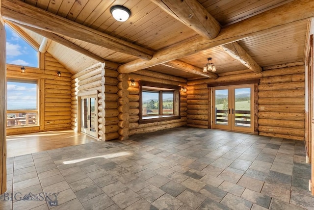 1380 Glacier View Dr, Deer Lodge, MT 59722 - unfurnished living room featuring french doors, wood ceiling with exposed beams, healthy amount of natural light, a chandelier, and rustic walls