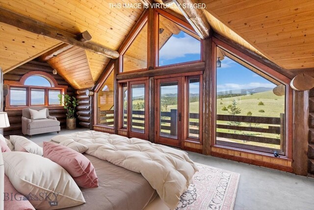 1380 Glacier View Dr, Deer Lodge, MT 59722 - carpeted bedroom with wooden ceiling, access to exterior, and rustic walls