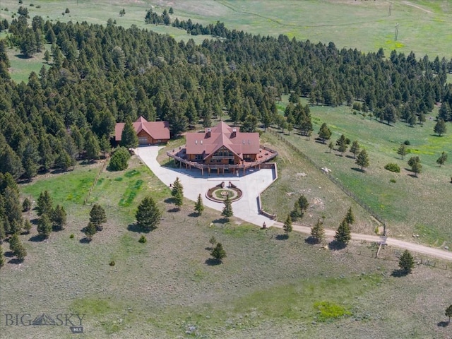 1380 Glacier View Dr, Deer Lodge, MT 59722 - view of subject property with a forest