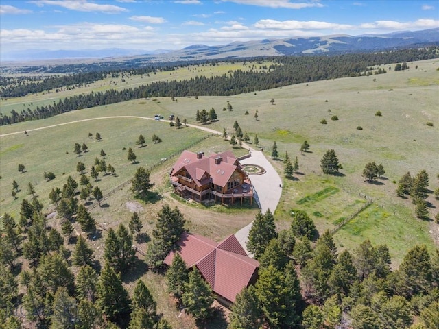 1380 Glacier View Dr, Deer Lodge, MT 59722 - aerial view of sparsely populated area featuring a mountain backdrop