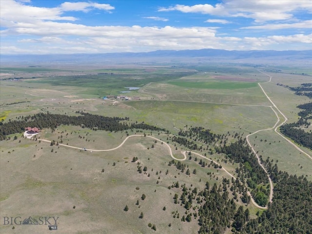 1380 Glacier View Dr, Deer Lodge, MT 59722 - aerial overview of property's location featuring rural landscape and a mountainous background