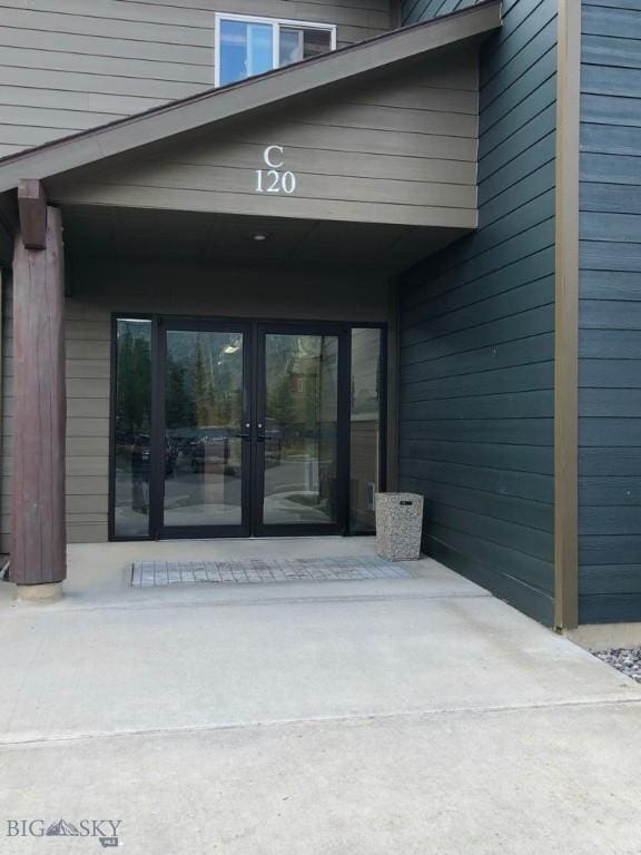 120 Firelight Dr Unit C15, Big Sky, MT 59716 - view of exterior entry featuring french doors