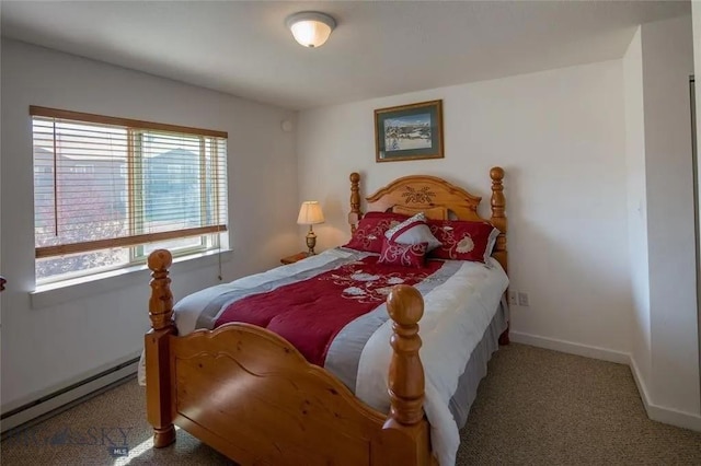 120 Firelight Dr Unit C15, Big Sky, MT 59716 - bedroom with a baseboard radiator and carpet floors