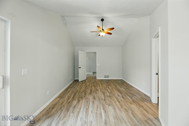 1205 Brentwood, Bozeman, MT 59718 - empty room featuring vaulted ceiling, ceiling fan, light wood-type flooring, and baseboards