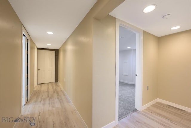 411 W 7th St, Anaconda, MT 59711 - hallway with light wood finished floors, baseboards, and recessed lighting