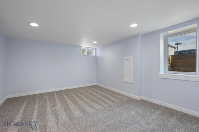 411 W 7th St, Anaconda, MT 59711 - below grade area with carpet, baseboards, and recessed lighting