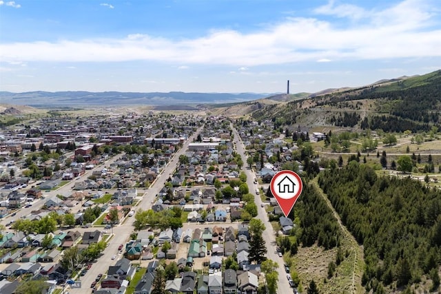 411 W 7th St, Anaconda, MT 59711 - aerial view of property's location featuring a mountainous background and nearby suburban area