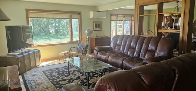 13 Shefield Dr, Ennis, MT 59729 - living room with healthy amount of natural light, a wall unit AC, and baseboards