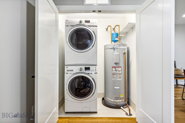 5 W Mendenhall Unit 417, Bozeman, MT 59715 - laundry room with electric water heater and estacked washer and dryer