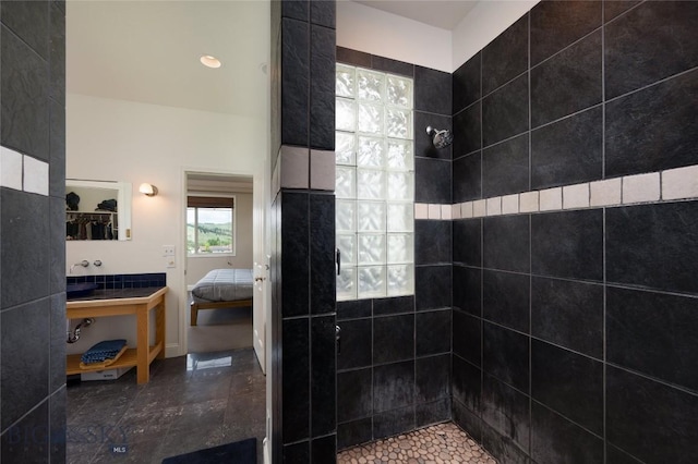 15 Blue Grouse Ct, Bozeman, MT 59715 - bathroom with a tile shower and ensuite bath