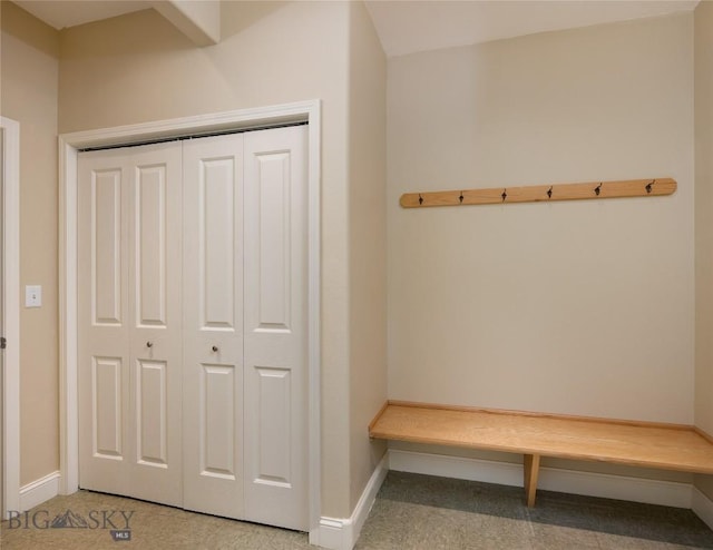 15 Blue Grouse Ct, Bozeman, MT 59715 - mudroom featuring baseboards and light carpet