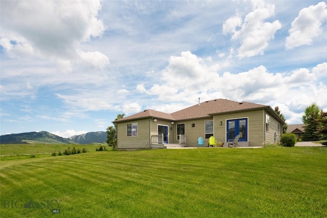 15 Blue Grouse Ct, Bozeman, MT 59715 - back of property with a yard and a mountain view