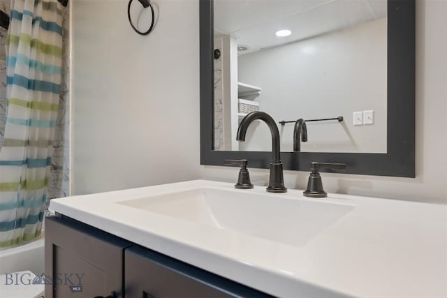 303 Sharon Ct, Anaconda, MT 59711 - full bathroom featuring vanity, shower / tub combo with curtain, and recessed lighting