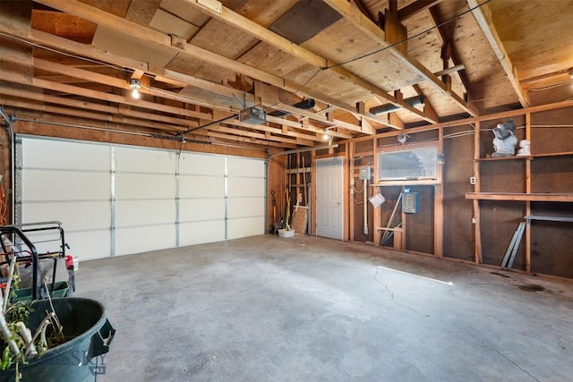 303 Sharon Ct, Anaconda, MT 59711 - garage featuring a garage door opener