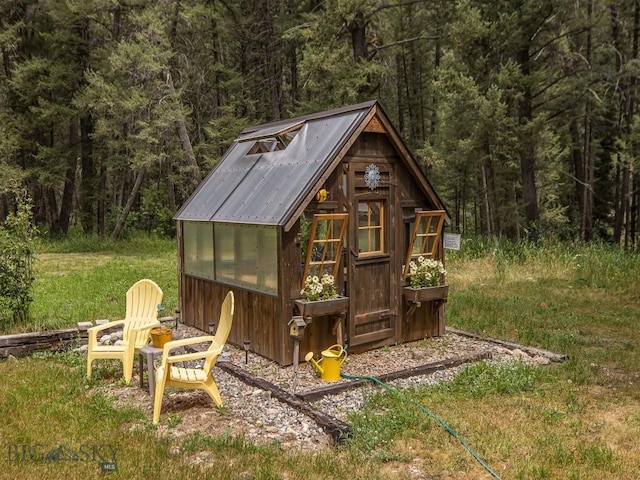 64370 Gallatin Rd, Gallatin Gateway, MT 59730 - view of greenhouse with a wooded view
