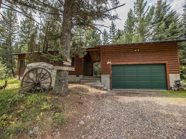 64370 Gallatin Rd, Gallatin Gateway, MT 59730 - modern home featuring gravel driveway, crawl space, and a garage