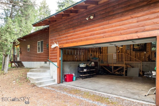 64370 Gallatin Rd, Gallatin Gateway, MT 59730 - view of property exterior featuring a garage and crawl space