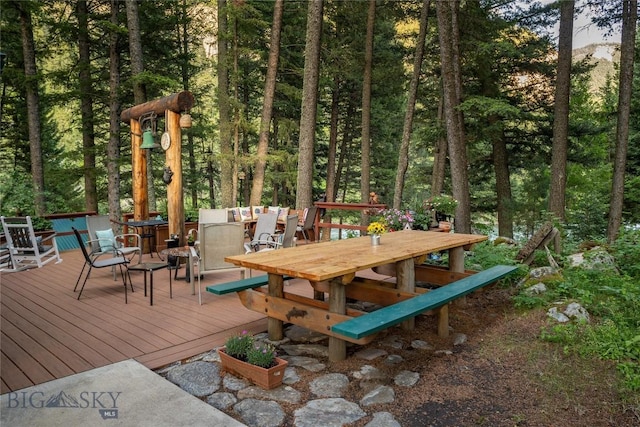 64370 Gallatin Rd, Gallatin Gateway, MT 59730 - wooden deck with outdoor dining area