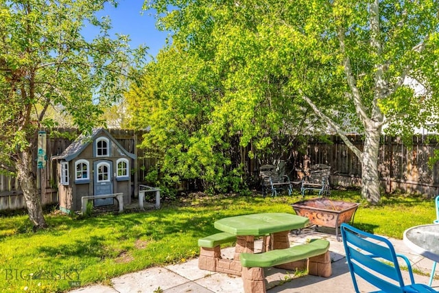 85 Shallow Brook Ln, Belgrade, MT 59714 - fenced backyard with a patio area