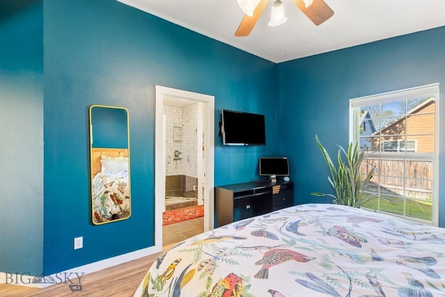 85 Shallow Brook Ln, Belgrade, MT 59714 - bedroom featuring wood finished floors, ensuite bath, and a ceiling fan