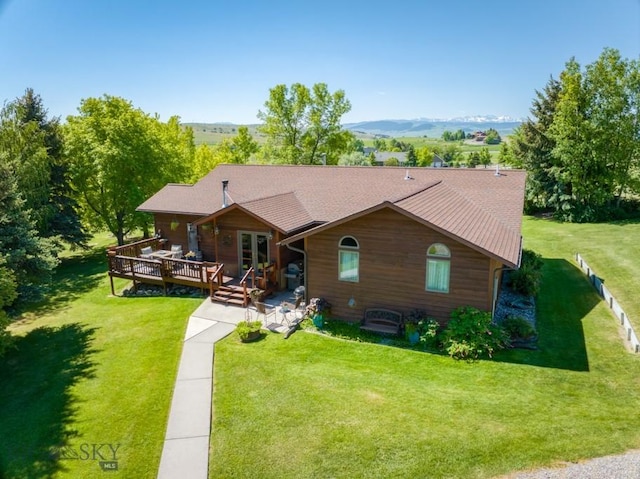 886 Wierda Way, Manhattan, MT 59741 - view of front of home featuring a wooden deck, a front yard, and french doors