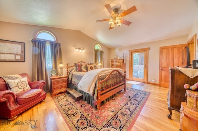 886 Wierda Way, Manhattan, MT 59741 - bedroom with light wood-style floors, multiple windows, access to exterior, lofted ceiling, and ceiling fan