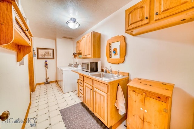 886 Wierda Way, Manhattan, MT 59741 - laundry area with light floors, washing machine and dryer, and cabinet space