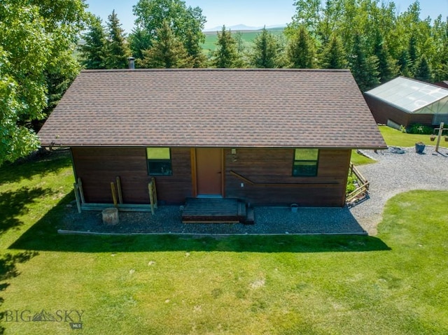886 Wierda Way, Manhattan, MT 59741 - view of front of house with a front lawn and a shingled roof