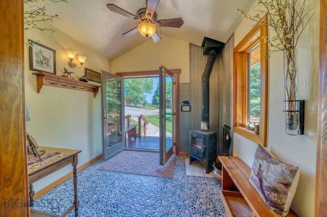 886 Wierda Way, Manhattan, MT 59741 - entryway with a wood stove, lofted ceiling, and a ceiling fan