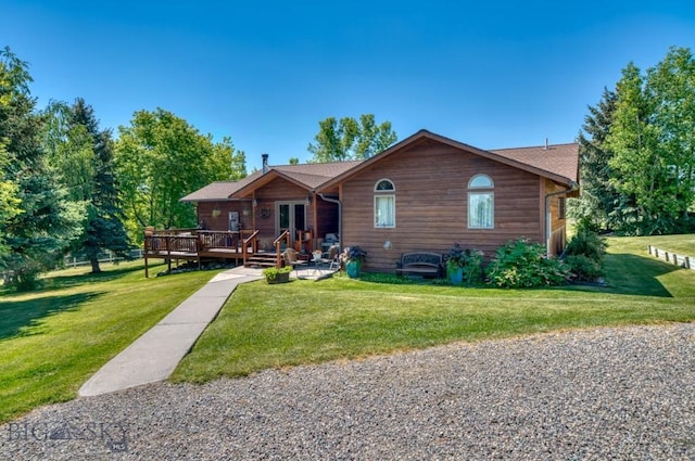 886 Wierda Way, Manhattan, MT 59741 - view of front facade with a front yard and a deck