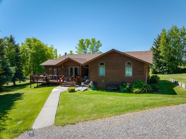 886 Wierda Way, Manhattan, MT 59741 - view of front of house with a front yard and a deck