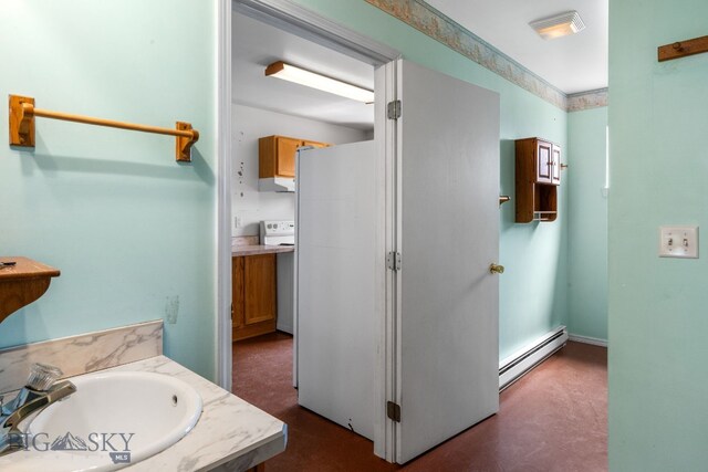 6385 Mt Highway 41, Whitehall, MT 59759 - bathroom with baseboard heating and vanity