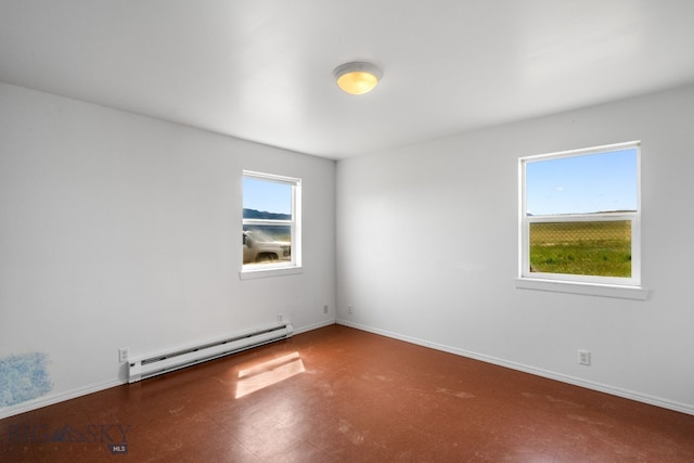 6385 Mt Highway 41, Whitehall, MT 59759 - spare room with a baseboard heating unit and tile patterned floors