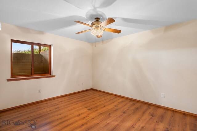 6385 Mt Highway 41, Whitehall, MT 59759 - unfurnished room featuring wood finished floors and a ceiling fan