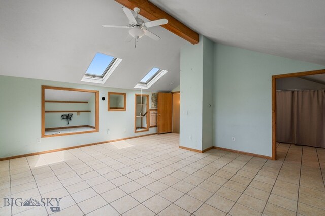6385 Mt Highway 41, Whitehall, MT 59759 - unfurnished living room with a skylight, ceiling fan, and light tile patterned flooring