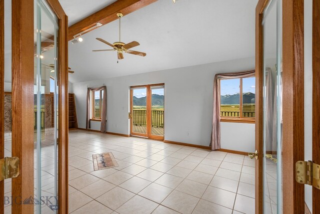 6385 Mt Highway 41, Whitehall, MT 59759 - spare room with ceiling fan, light tile patterned floors, and a mountain view