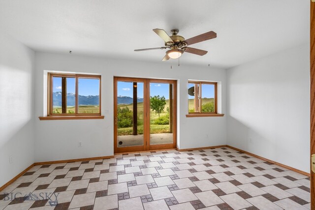 6385 Mt Highway 41, Whitehall, MT 59759 - unfurnished room featuring baseboards and ceiling fan