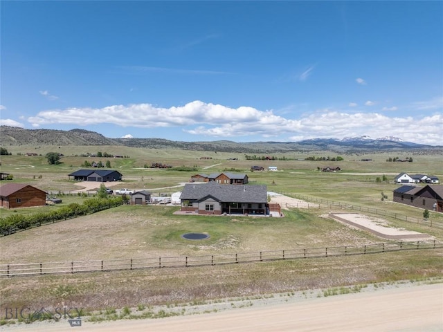 8 Sunset Ct, Ennis, MT 59729 - overview of rural landscape with agricultural land and a mountain backdrop