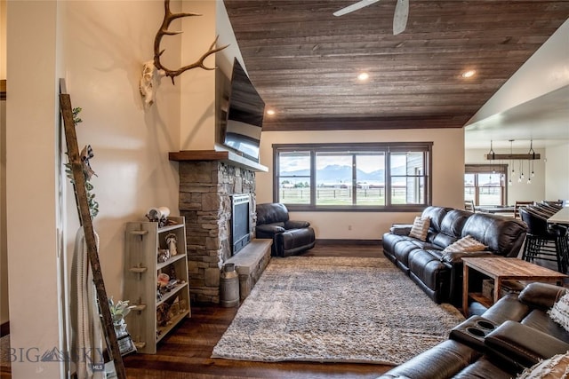 8 Sunset Ct, Ennis, MT 59729 - living room with vaulted ceiling, dark wood-style floors, wooden ceiling, a stone fireplace, and recessed lighting