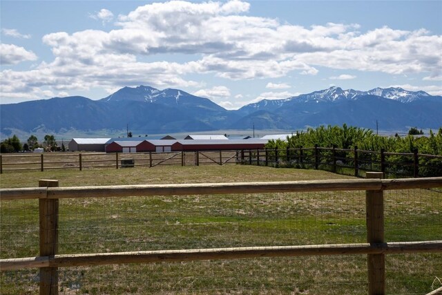 8 Sunset Ct, Ennis, MT 59729 - view of mountain backdrop with rural landscape and a pastoral area