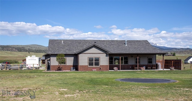 8 Sunset Ct, Ennis, MT 59729 - rear view of property featuring a mountain view