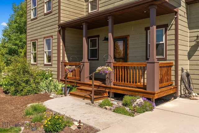 109 Baker St, Belgrade, MT 59714 - doorway to property with a porch