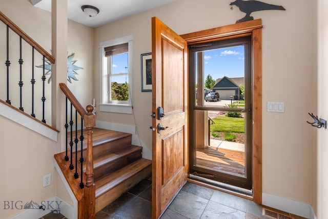 109 Baker St, Belgrade, MT 59714 - foyer with stairs and baseboards