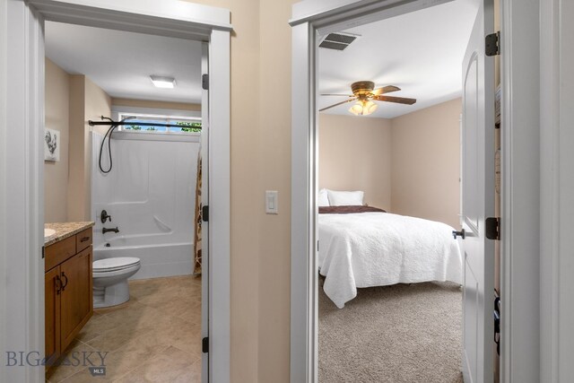109 Baker St, Belgrade, MT 59714 - bedroom featuring ensuite bath and light tile patterned floors