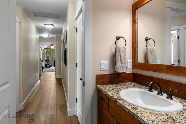 109 Baker St, Belgrade, MT 59714 - bathroom with wood finished floors and vanity