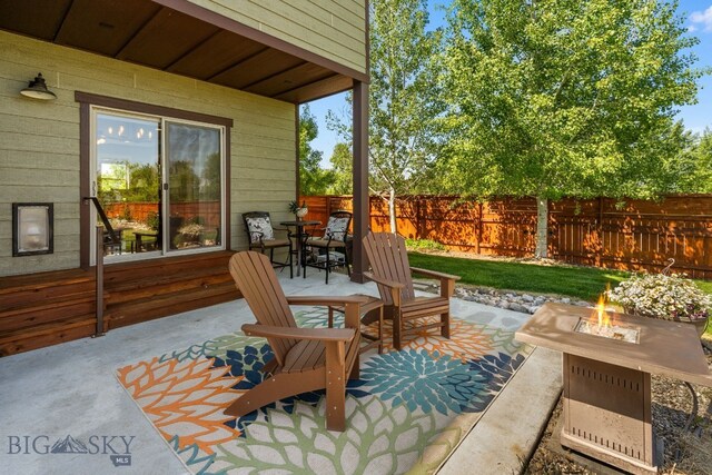 109 Baker St, Belgrade, MT 59714 - view of patio / terrace with a fire pit and outdoor dining space