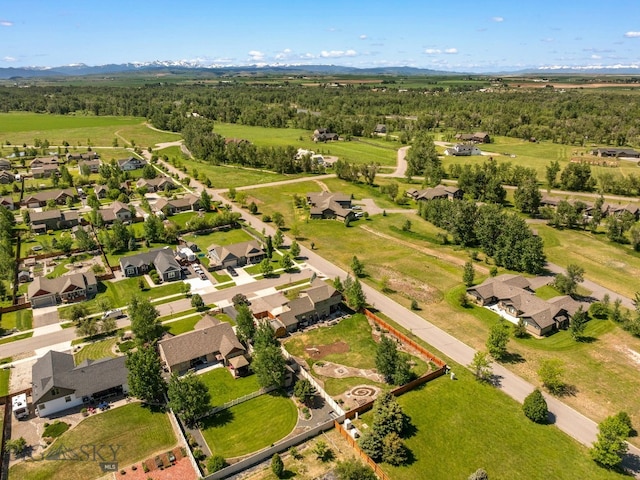 109 Baker St, Belgrade, MT 59714 - aerial perspective of suburban area featuring mountains