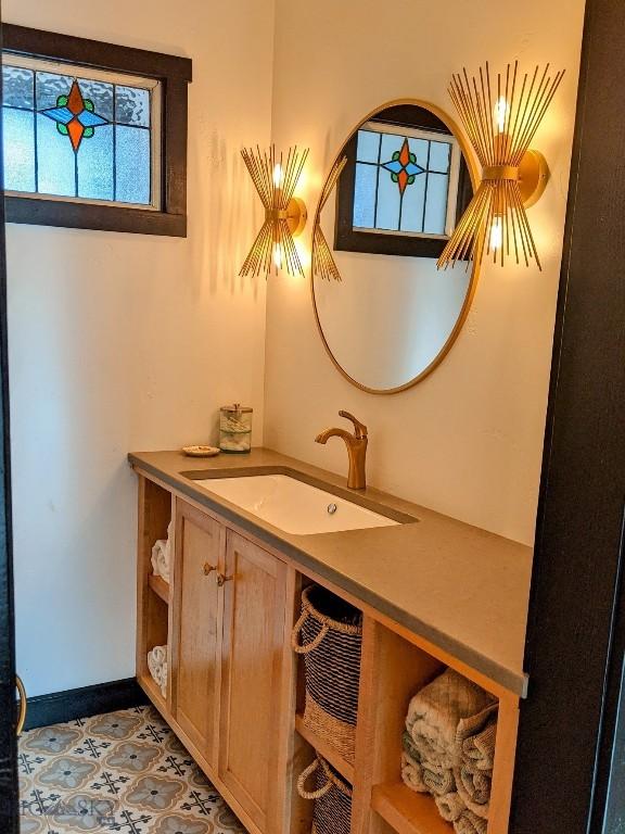 401 S Bozeman Ave, Bozeman, MT 59715 - bathroom featuring vanity and baseboards