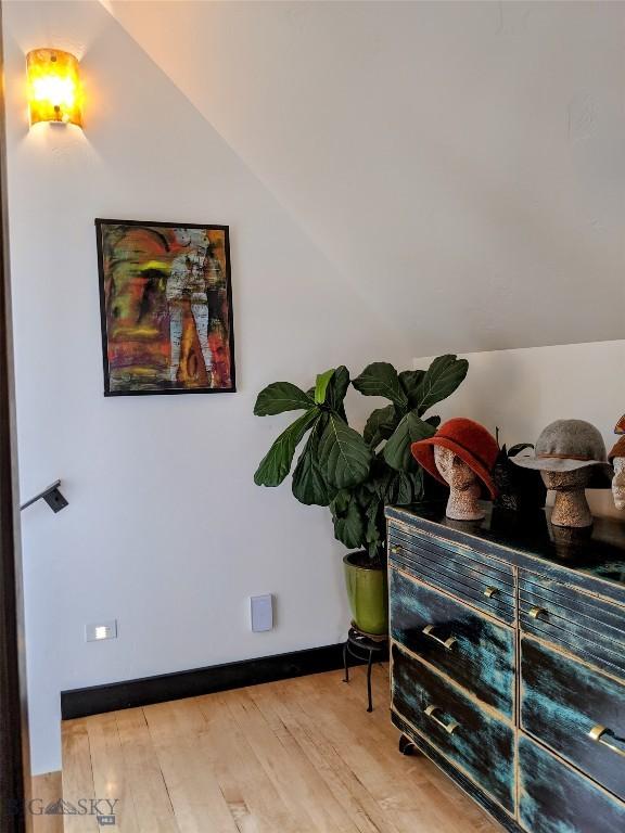 401 S Bozeman Ave, Bozeman, MT 59715 - bedroom with wood finished floors and vaulted ceiling