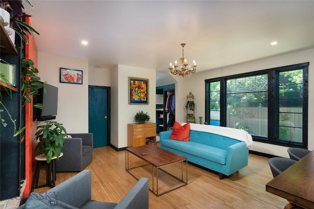 401 S Bozeman Ave, Bozeman, MT 59715 - living area with wood finished floors, a chandelier, and recessed lighting